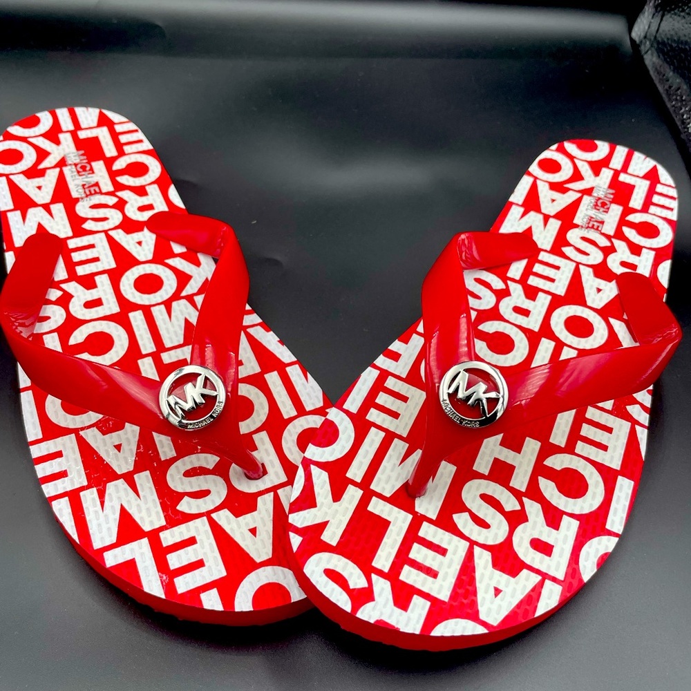 Michael Kors flip flops never worn